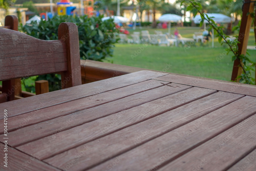 Background of a dark wooden table in a cafe Background of a dark wooden table in a cafe