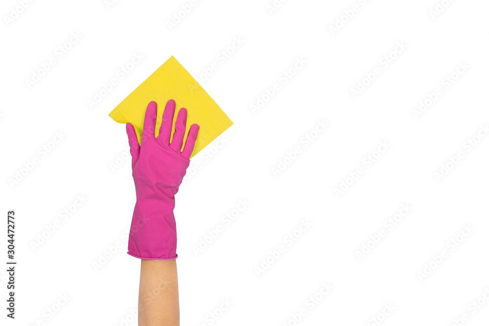 A hand in a glove holds a microfiber cloth for washing and cleaning dishes A hand in a glove holds a microfiber cloth for washing and cleaning dishes