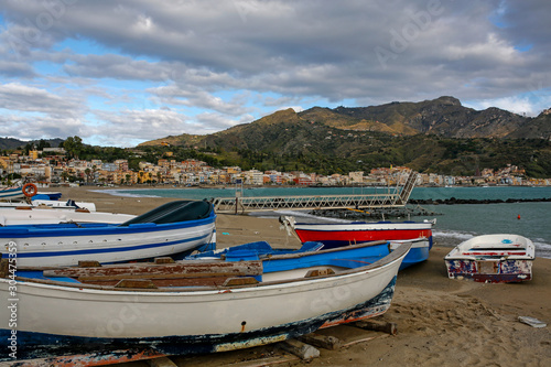 fishing boats in Giardini-Naxos touristic resort on Sicili, Italy