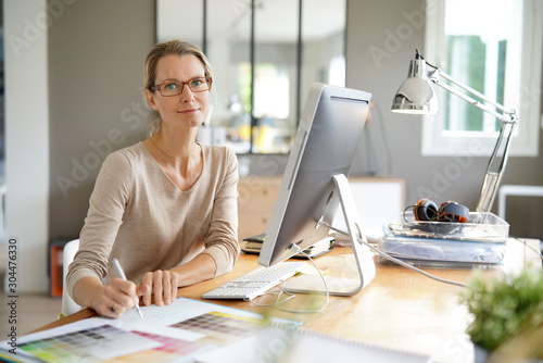 young businesswoman with glasses in an office