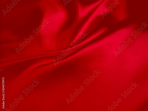 red abstract background luxury cloth or liquid wave or wavy folds of grunge silk texture satin velvet material or luxurious background or elegant wallpaper design, background