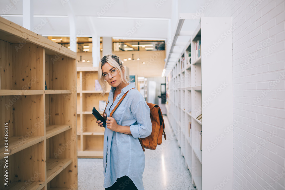 Casual Hipster Style Young Woman Portrait. Girl Standing Near the