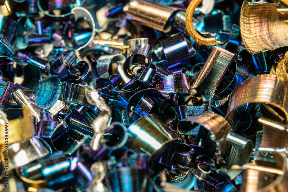 Industrial waste in the form of sharp metal chips. Industrial metal debris. Industrial waste in the form of sharp metal chips. Industrial metal debris.