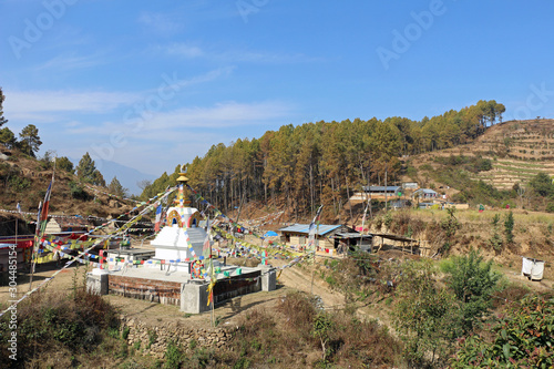 A small village in Nepal with a temple photo