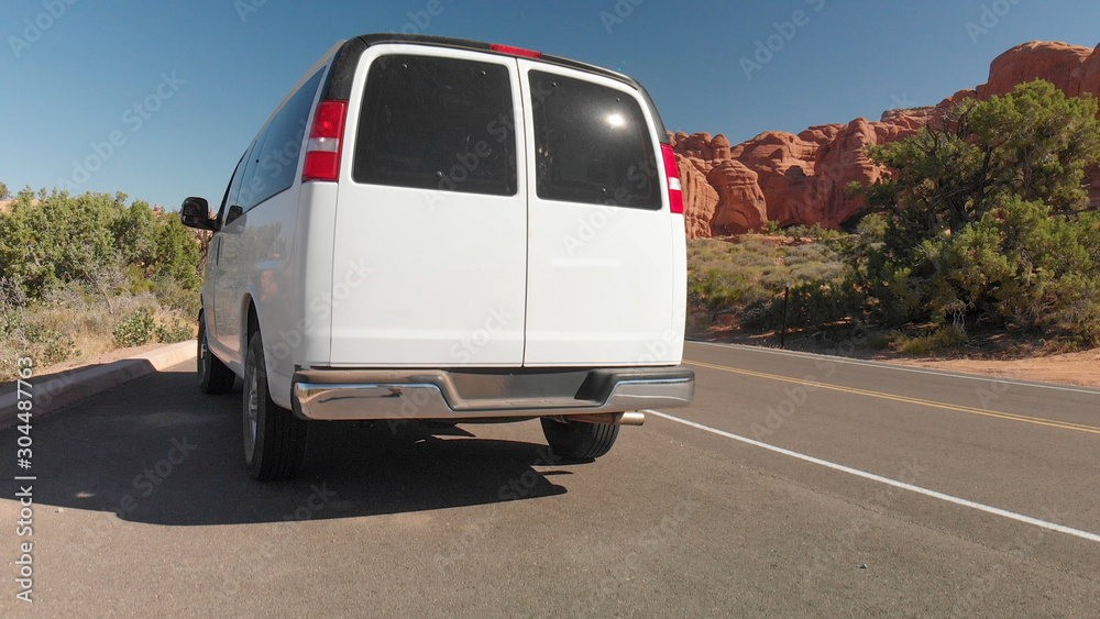 Van parked along Arches National park road, Utah Van parked along Arches National park road, Utah