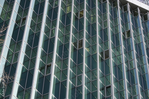 part of the high glass-and-concrete houses or office buildings, skyscrapers. modern construction of large cities