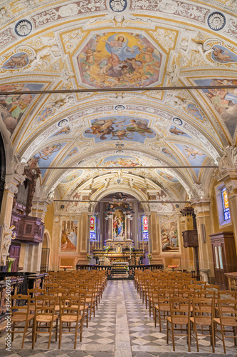 OSSUCCIO, ITALY - MAY 8, 2015: The nave of baroque church Sacro Monte della Beata Vergine del Soccorso with the frescoes by Salvatore Pozzi di Puria (1595 – 1681).