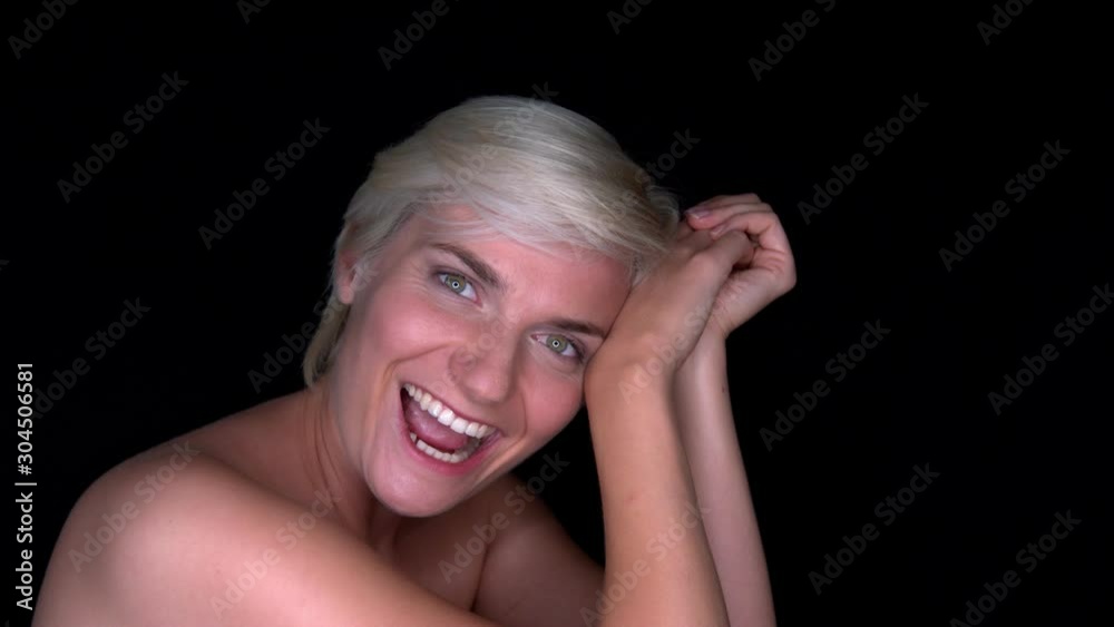 nude caucasian lady with open mouth smiling, dolly in medium close up shot nude caucasian lady with open mouth smiling, dolly in medium close up shot