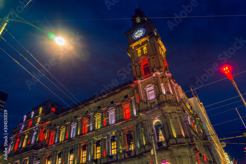 Illuminated building of General Post Office with the Clock Tower at night, Melbourne. © photoopus
