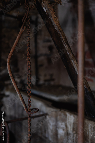 iron rusted necklace chain on a abandoned farm