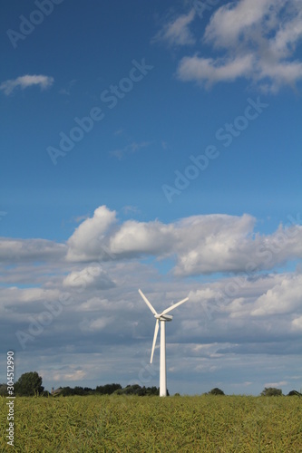 Clean electricity being generated by wind turbine in field In Yorkshire UK, Britain