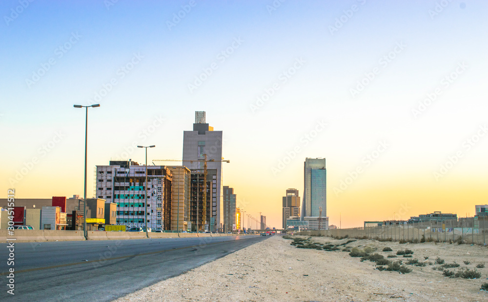 Fototapeta premium beautiful clean and growing city and skyscrapers of middle east with blue sky