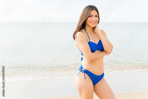 Charming Woman In Bikini At Beach