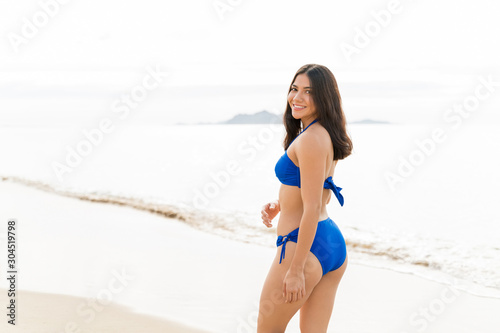 Beautiful Woman Standing At Beach