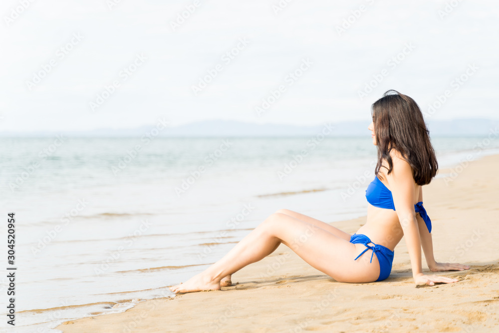 Bikini Woman Relaxing On Beach