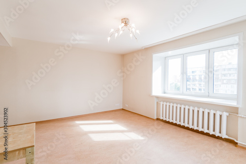 Russia, Moscow- July 06, 2019: interior room apartment. standard repair decoration in hostel. bright empty room without furniture