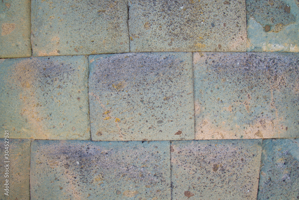 Obraz premium Close up of an Incan wall, made of squared stones perfectly smoothed and wedged one to each other