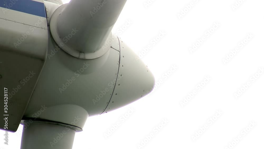 Wind turbine under a cloudy sky