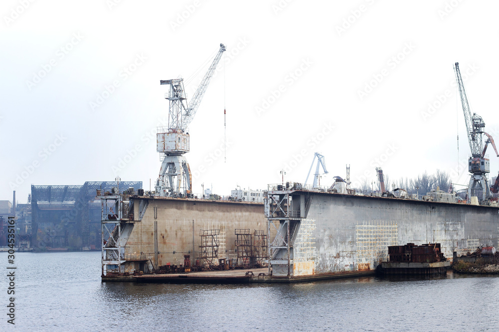 Shipbuilding of the last century, old bay with ships Shipbuilding of the last century, old bay with ships