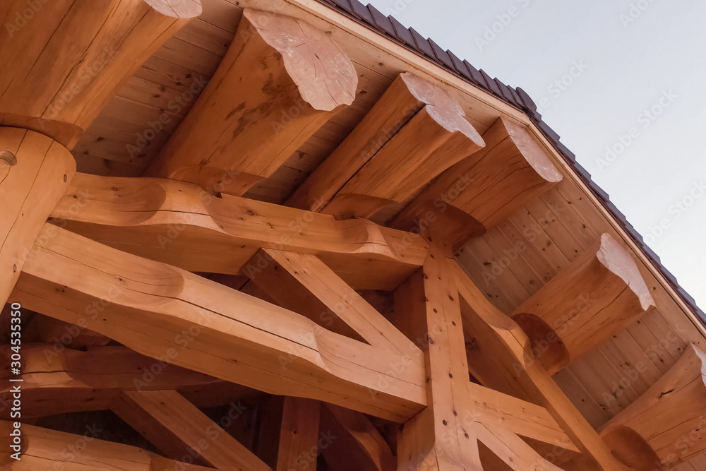 Details and elements of wooden house made of timber. The constru Details and elements of wooden house made of timber. The constru