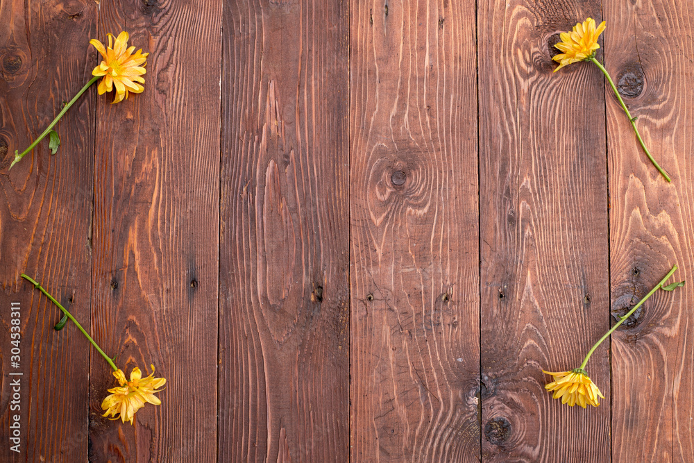 Wooden background with flowers for a frame. Wooden background with flowers for a frame.