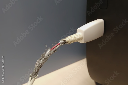 torn braid insulation on a usb wire