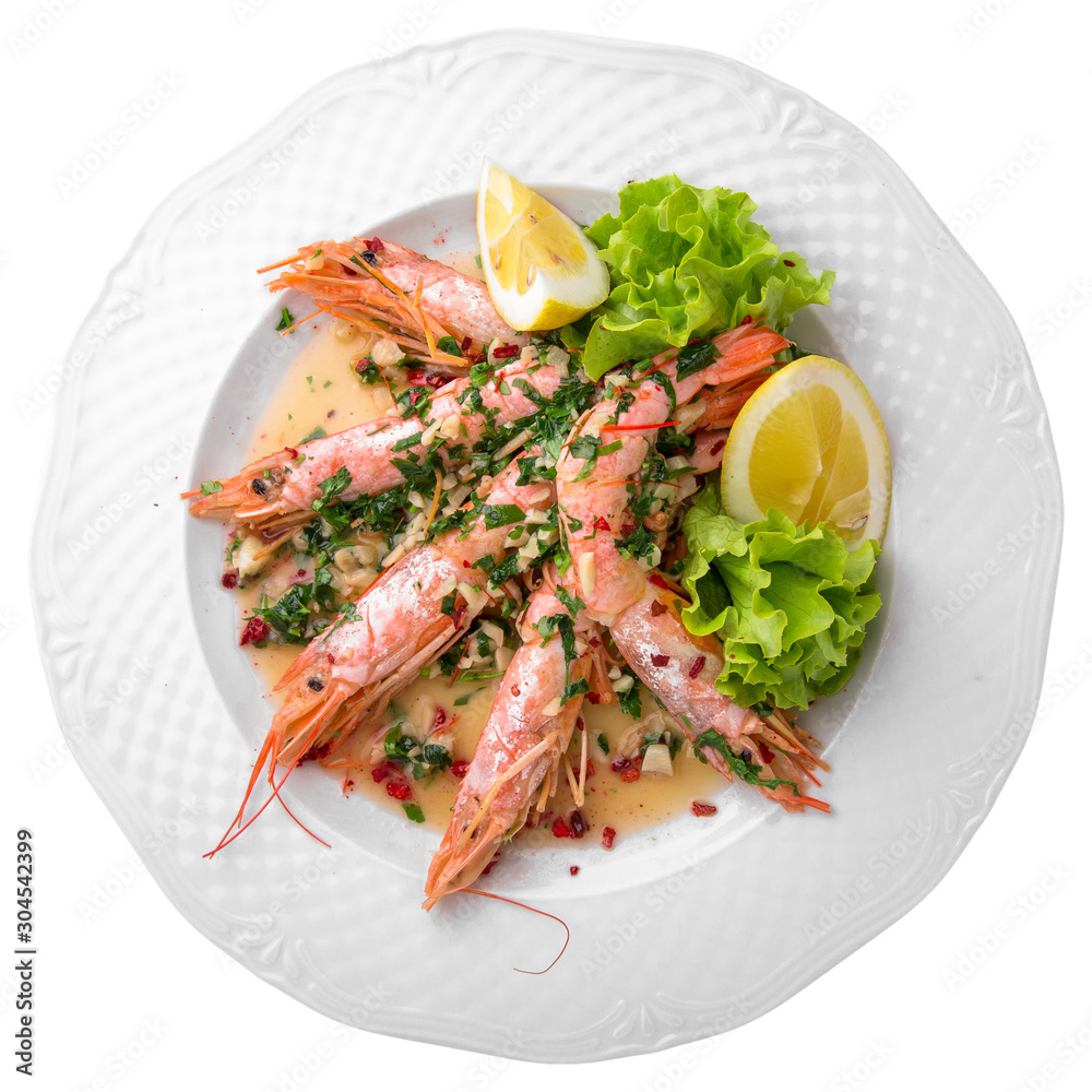 King prawns, or langoustines with sauce and herbs. Gourmet restaurant menu. Isolated on white background. Flat lay top view