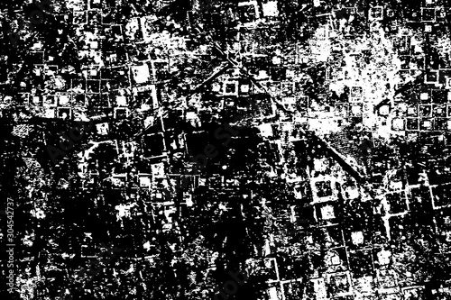 Dirty grunge background. Black and white gloomy texture. Worn old surface. Pattern of cracks, chips, scuffs, scratches. Pattern for backdrops and design creation