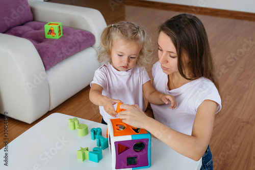 Child learning colors, letters and improve fine motor skills