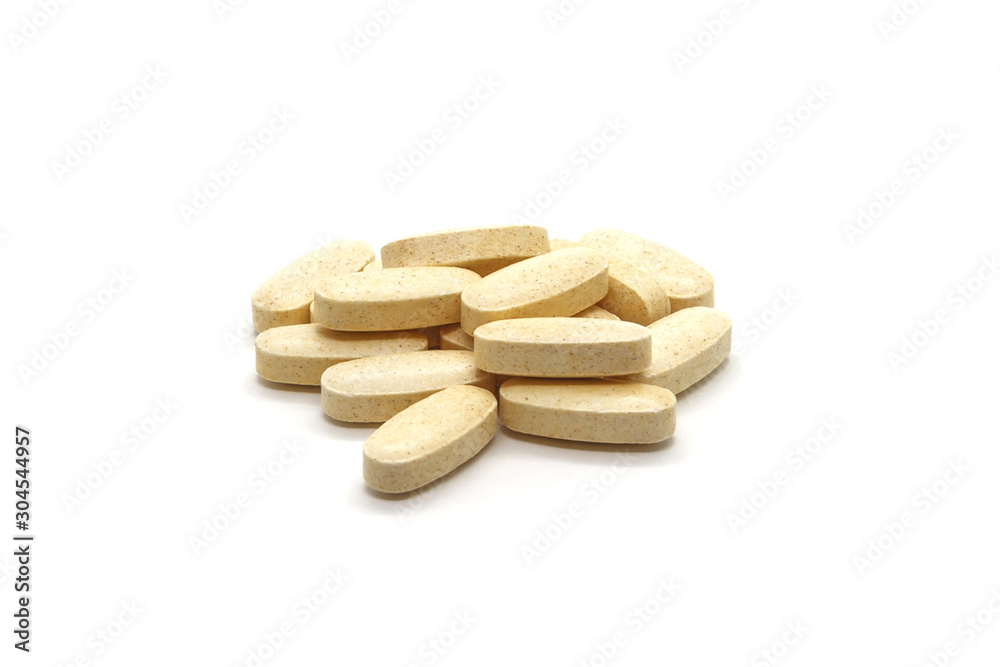 Vitamin C in tablets on a white background Vitamin C in tablets on a white background