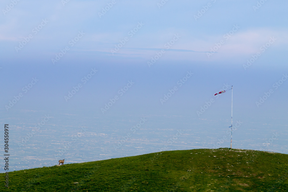 Isolated windsock on blue sky, sport background Isolated windsock on blue sky, sport background