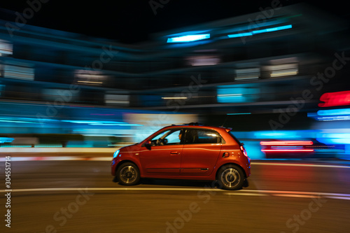 Monaco city night car traffic near Hotels and Casino