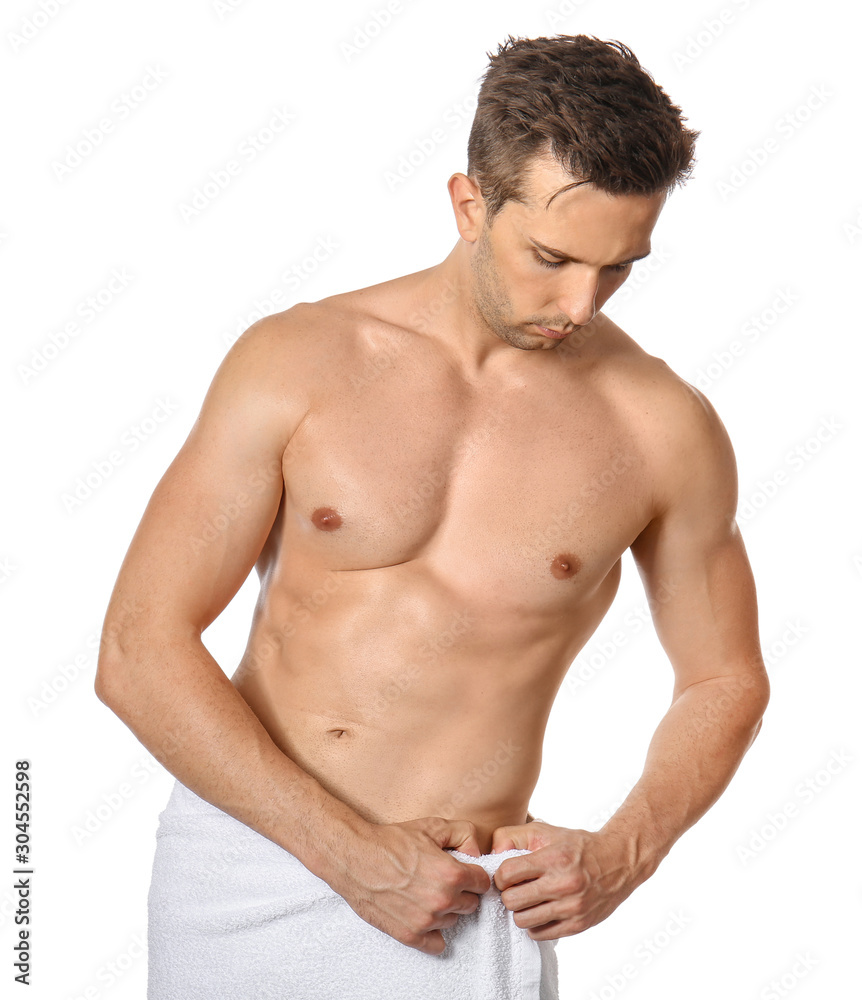 Handsome young man after depilation on white background