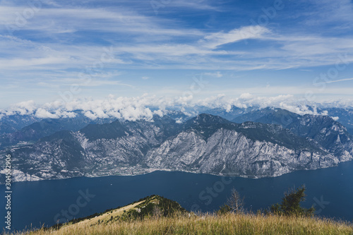 View of Monte Bestone and Garda villages from top of Monte Baldo in Italy