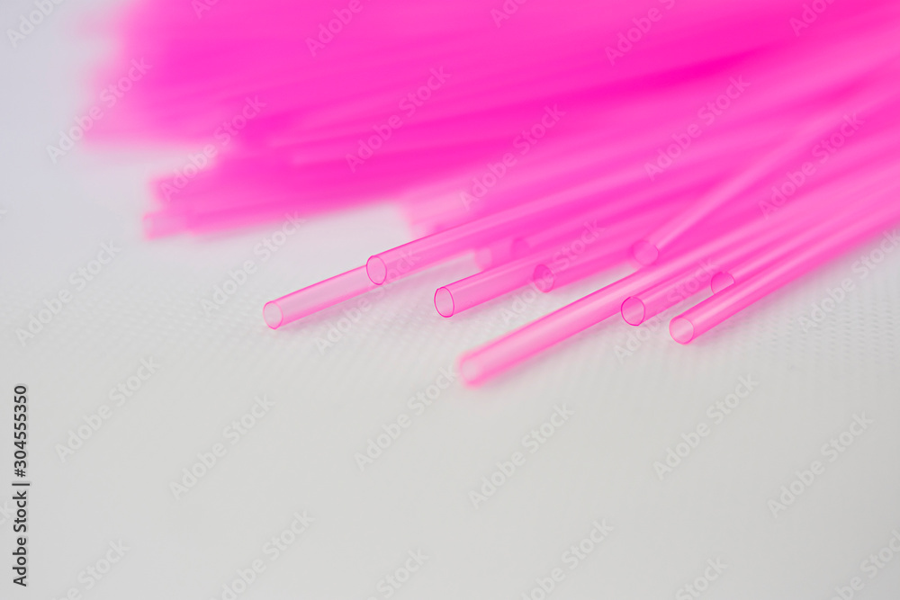 Pink plastic straws for use with drinks such as soft drinks, juices and alcohol Pink plastic straws for use with drinks such as soft drinks, juices and alcohol