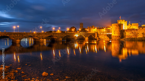Bridge across the Shannon river leading to King John's Castle in Limerick City, Ireland
