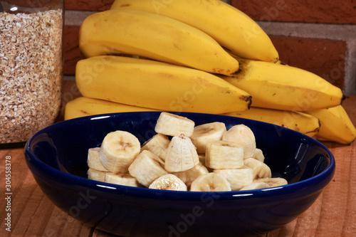 chopped and natural bananas with oats, natural food and fiber