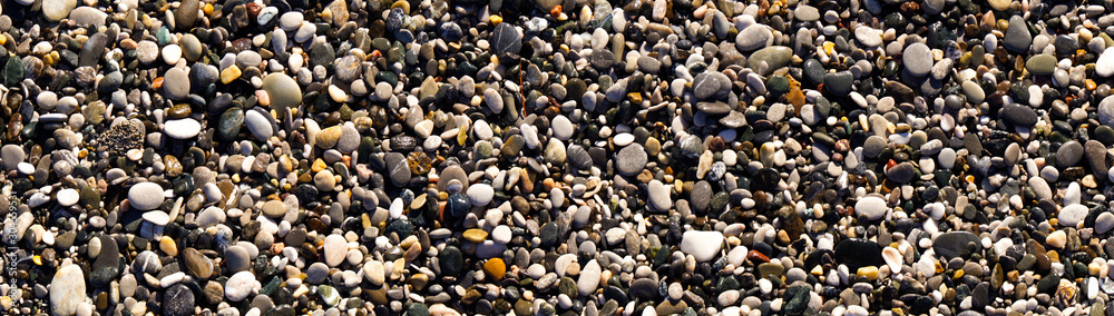 Pebble stones on the beach. Summer time concept.  