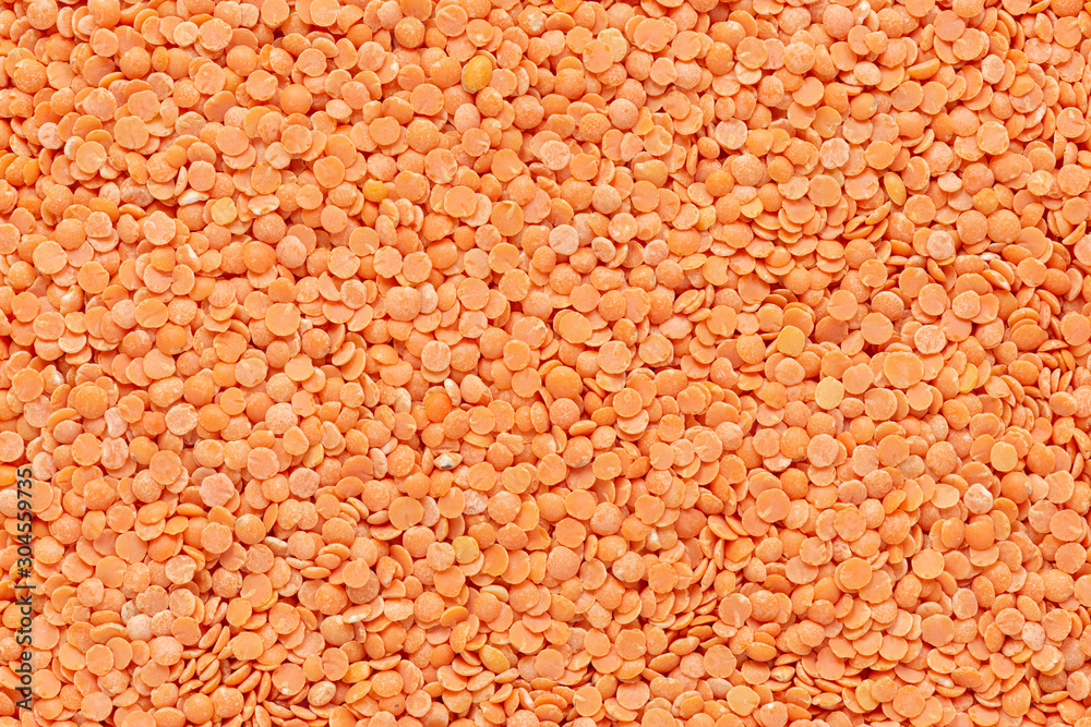 Close up macro of raw red lentils Close up macro of raw red lentils