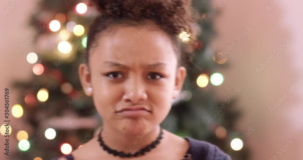 Young girl opens a present and is surprised - shot on RED