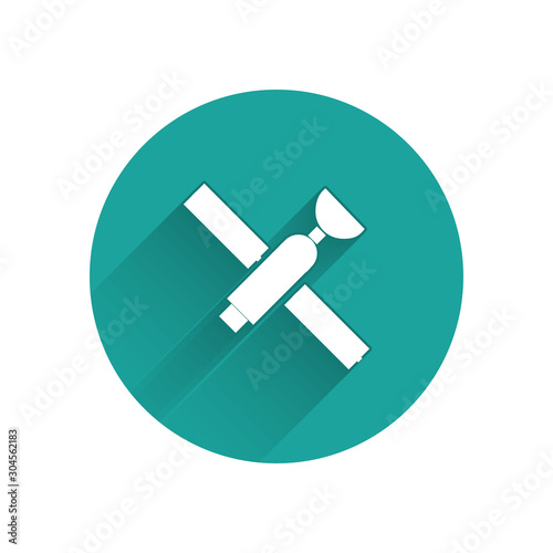 White Satellite icon isolated with long shadow. Green circle button. Vector Illustration