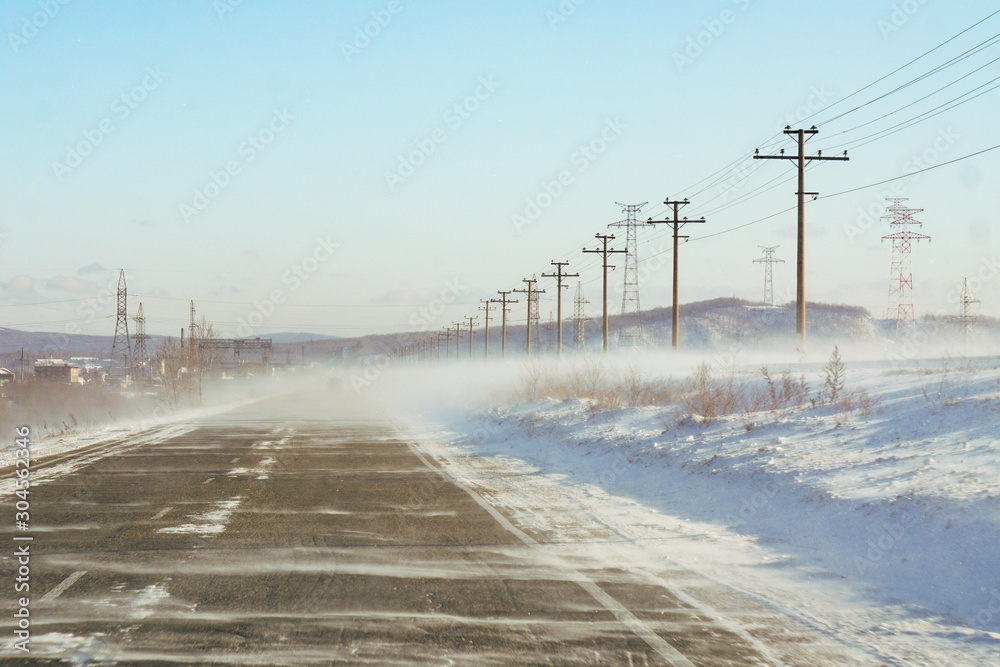 winter track, snowstorm and snow, cyclone, dangerous road, wind, middle lane of Russia, asphalt, speed  