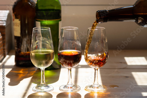 Sherry wine tasting, selection of different jerez fortified wines from dry to very sweet in glasses, Jerez de la Frontera, Andalusia, Spain