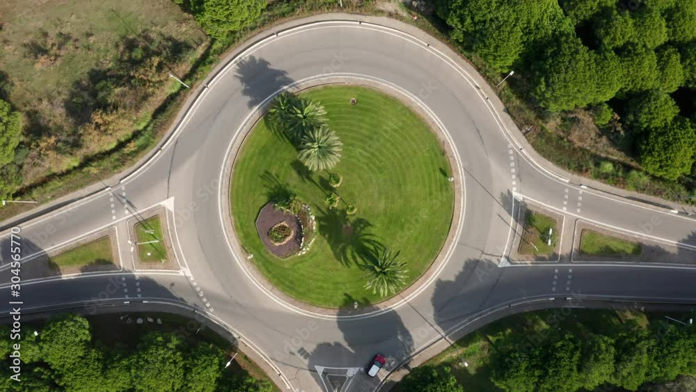 Roundabout with palm trees aerial top shot freeway la Grande Motte