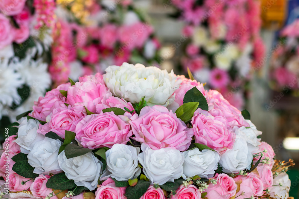 Beautiful artificial pink and white rose bouquet. Beautiful artificial pink and white rose bouquet.