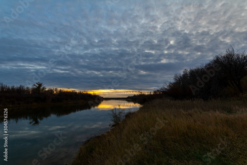 Sunset by the river