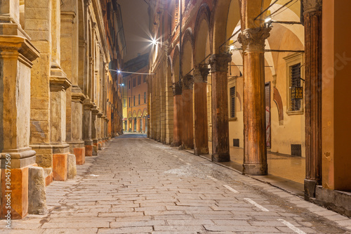 Bologna -  The porticoes of old town in the morning. photo