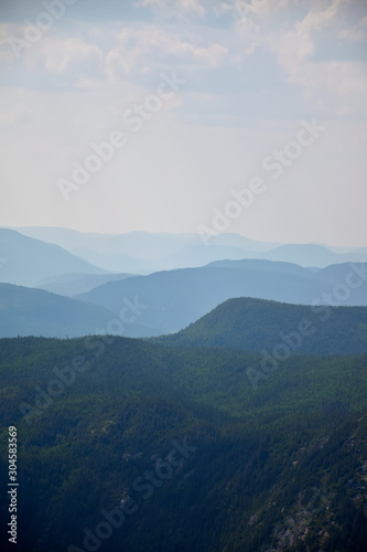 View of multiple levels of moutains from the top of the Acrople des Draveurs trail at the Hautes-Gorges-de-la-Rivière-Malbaie National Park (SEPAQ), Charlevoix Region, Quebec, Canada