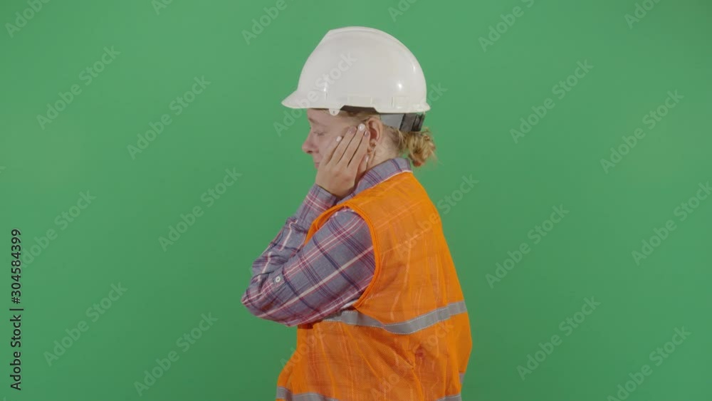 Woman Engineer Rubbing Face With Frustration Woman Engineer Rubbing Face With Frustration