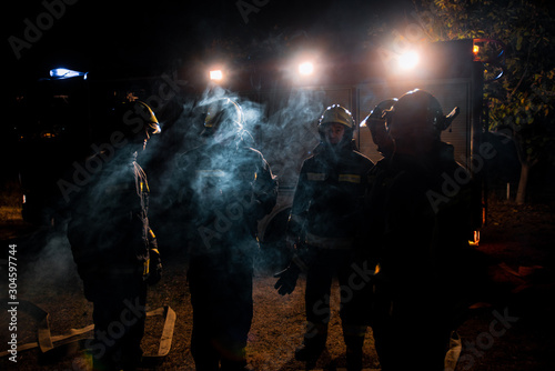 Fire brigade in action at night time